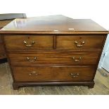 A late 19thc. mahogany chest of drawers, the rectangular top with moulded edge, above two short over