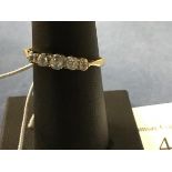 A five stone diamond ring on 18ct band (R) (2.4g)