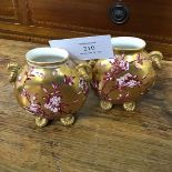 A pair of Coalport late 19thc miniature ovoid vases, with pink briar rose decoration and gilt