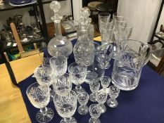 A mixed lot of glassware including a square spirit decanter (h.25cm), a hobnail cut decanter,