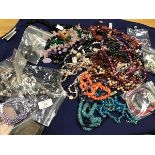 A mixed lot of beads, necklaces, pendants, bracelets, many set hardstone, mother of pearl,