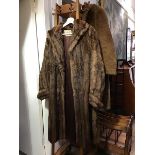 A vintage lady's musquash coat, Arnold Seftor, Marchmont, Edinburgh, together with a vintage wool