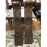 A pair of late 19thc carved pine mantle legs, the shaped corbal top with carved leaf and centre