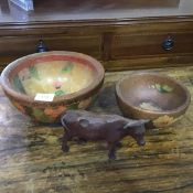 Two 1920s treen fruit and floral decorated bowls together with a Swiss treen carved heffer (3)