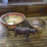 Two 1920s treen fruit and floral decorated bowls together with a Swiss treen carved heffer (3)