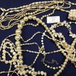 A mixed lot comprising two strands of pearl beads with yellow metal clasp, together with