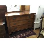 A 19thc mahogany ledgeback chest (modified), the plain top above three long drawers with metal