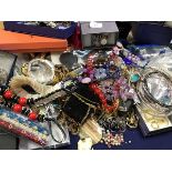 A box containing a large quantity of costume and vintage style jewellery including watches,