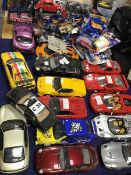 A collection of model cars, 1/18th scale by UT Motors and Hotwheels etc., including Ferrari,