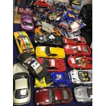 A collection of model cars, 1/18th scale by UT Motors and Hotwheels etc., including Ferrari,