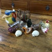 A mixed lot of glass, stone and pottery figures including chickens, a badger, birds etc. together