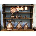 A set of seven 19thc. style copper tavern measures, two gallons reducing to gill, lead solder to