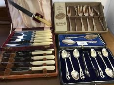 A mixed lot of boxed silver plated flatware including pastry forks, teaspoons and jam spoons