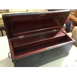 A 19thc Seamans unusual travelling chest with painted ebonised finish, the plain hinged top