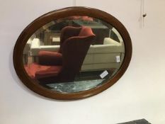 An early 20thc. mahogany framed mirror with satinwood inlay and bevelled glass plate (69cm x 53cm)