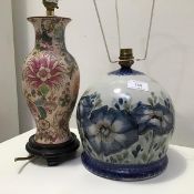 A Highland Stoneware circular floral decorated table lamp (lamp base: h.21cm) together with a modern