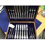An oak cased silver plated dessert set of twelve knives, six forks and six spoons, Elkingon & Co.,