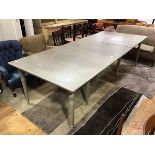 An Oka extending dining table in the Victorian style with painted finish in Lamp Room Gray, the
