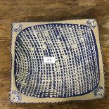 A blue and white slipware decorated stoneware bowl (5cm x 27cm x 24cm)