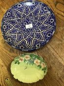 A Mediterranean blue and white decorated wall plaque (29cm), together with a handpainted oval dish