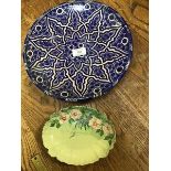 A Mediterranean blue and white decorated wall plaque (29cm), together with a handpainted oval dish