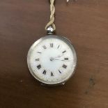 A late 19thc lady's silver pocketwatch, with engraved case, white enamelled dial, with roman