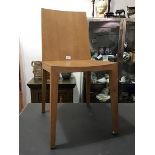 A set of six Danish oak dining chairs, the plain tapered backs and seat, on square tapered
