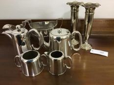 A mixed lot of Epns including a four piece tea set, including sugar and cream, a pair of plated