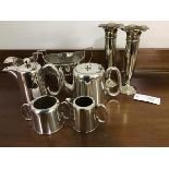 A mixed lot of Epns including a four piece tea set, including sugar and cream, a pair of plated