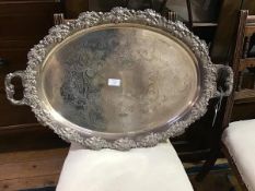 A Sheffield plate twin handled tray with cast handles with grape leaf and vine decoration, the