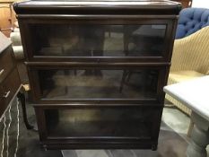 An Edwardian mahogany Globe Wernicke three section, sectional bookcase, the plain top above three