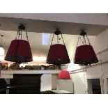 A set of three large pendant lights with bronze fittings, the top plate with three fancy link chains