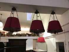 A set of three large pendant lights with bronze fittings, the top plate with three fancy link chains