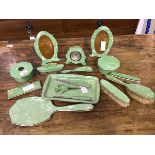 An unusual 17 piece 1930's green pearlised early plastic Art Deco dressing table set comprising