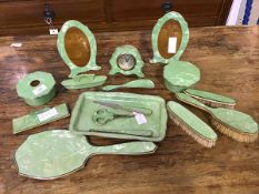 An unusual 17 piece 1930's green pearlised early plastic Art Deco dressing table set comprising