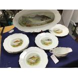 A Royal Austria 10 piece fish service, with transfer printed perch and other freshwater fish design,