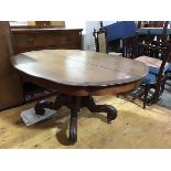 A 19thc Continental mahogany dining table, the oval scalloped top, raised on a spiral turned