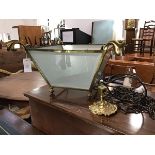 A 1920s hanging hall lantern light, the open top with four hooks and cast protruding leaf