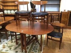 A Jentique 1970's 5 piece teak dining room suite table and chairs, the drop leaf table with curved