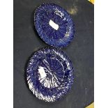 A pair of unusual 19thc blue glazed majolica leaf pattern plates (losses) (d.21cm)