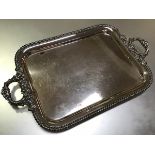 A substantial 19th century silver-plate on copper twin-handled tray, of rectangular form, with