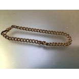 A 9ct gold curblink bracelet, on a lobster clasp. 19.5cm, 17 grams