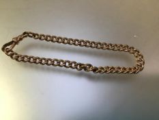 A 9ct gold curblink bracelet, on a lobster clasp. 19.5cm, 17 grams