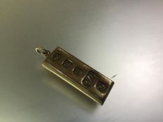 A 9ct gold ingot pendant, Sheffield 1978. Length excluding bale 40mm, 30 grams