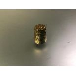 A 9ct gold thimble, Charles Horner, Chester 1928. 5 grams