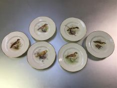 A set of six small Royal Worcester hand-painted bird plates, factory marks mostly 1908, each