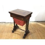 A Scottish George IV rosewood work table of small proportions, the hinged rectangular top above a