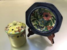 Strathyre Pottery: a preserve jar by Mary A. Ramsay, painted with flowers against a yellow ground,