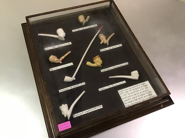 A group of eight English clay pipes, 19th and early 20th century, some with portrait bowls including