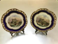 A pair of 19th century hand-painted named view cabinet plates, possibly Coalport, each decorated